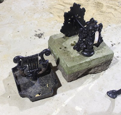 Lot 698 - A lyre shaped cast iron boot scraper and...