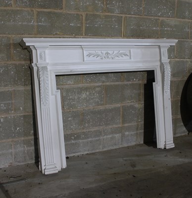 Lot 705 - A white painted fire surround with acanthus...