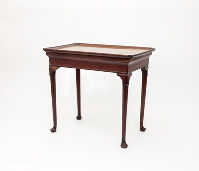 Lot 716 - A George II mahogany silver table, the dished...