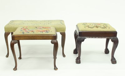 Lot 728 - A George II style footstool on leaf carved...