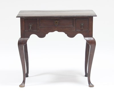 Lot 736 - A George III 18th Century oak three-drawer...