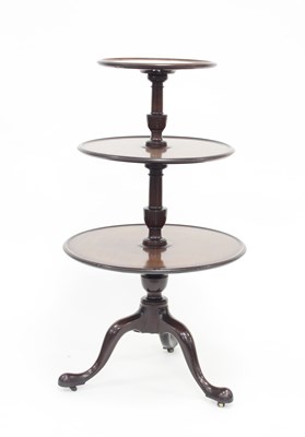 Lot 751 - A George III mahogany three-tier dumb waiter...