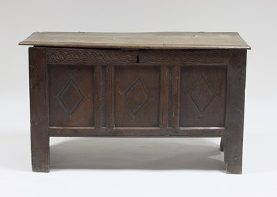 Lot 764 - A 17th Century oak chest with plank lid and...