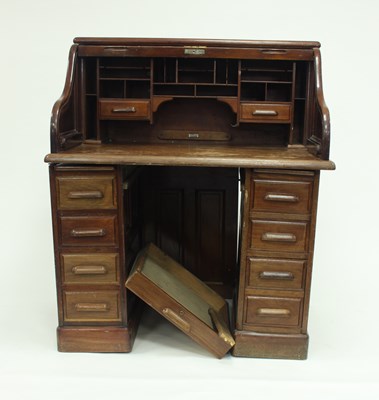 Lot 771 - An Edwardian mahogany estate desk by Simpole's...