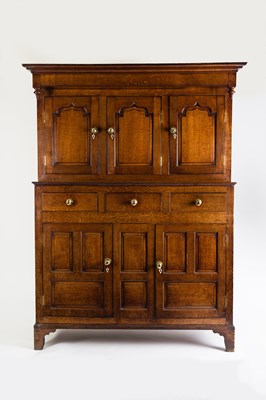 Lot 775 - A Welsh oak duodarn, circa 1800, the moulded...