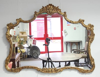 Lot 778 - A Georgian style rococo overmantel mirror,...