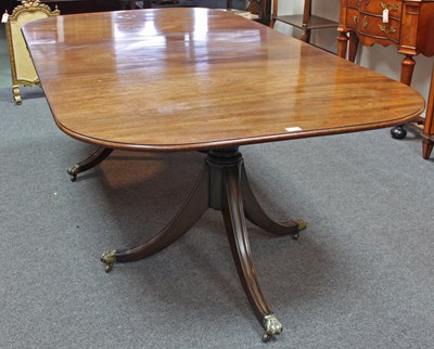 Lot 783 - A George III style mahogany two-pillar dining...