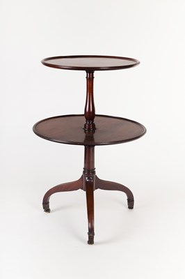 Lot 785 - A George III mahogany two-tier dumb waiter,...