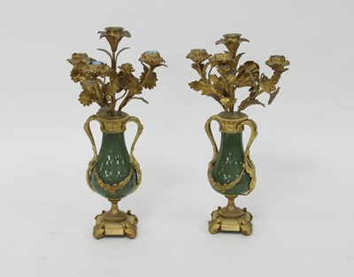 Lot 816 - A pair of ormolu four-branch candelabra floral...