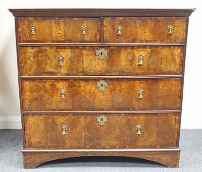 Lot 839 - A George I walnut chest fitted three long and...