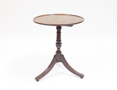 Lot 865 - A Regency mahogany tripod table, the dish top...