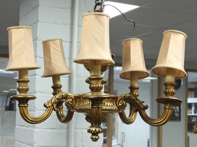 Lot 872 - A gilt wood five-light electrolier with carved...