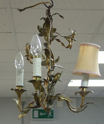 Lot 877 - A gilt metal three-light electrolier, entwined...