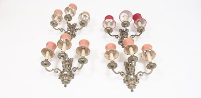 Lot 880 - Four silvered three-branch wall lights of...