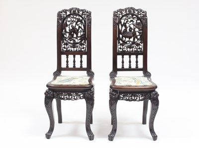 Lot 888 - A pair of Chinese pierced and carved hardwood...