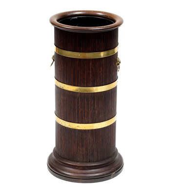 Lot 892 - An oak brass bound umbrella stand with reeded...