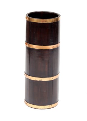 Lot 893 - An oak brass bound umbrella stand, 62cm high