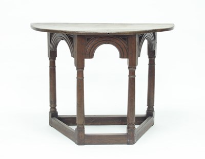 Lot 896 - An oak credence table, with half round top and...