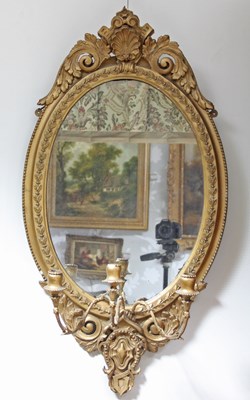 Lot 904 - A gilt plaster girandole with shell and scroll...