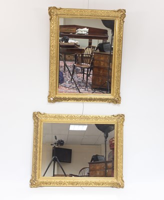 Lot 905 - A pair of rectangular wall mirrors with gilt...