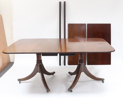 Lot 924 - A mahogany dining table of George III design,...