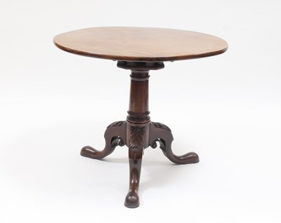 Lot 929 - A George III mahogany table on a carved and...