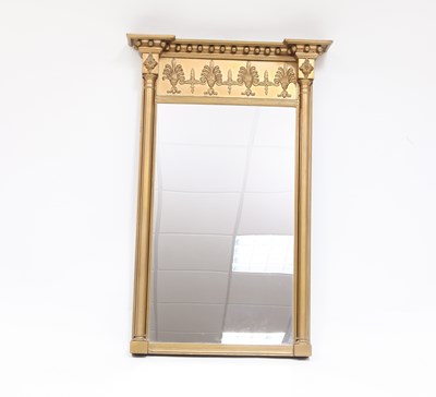 Lot 933 - A Regency gilt wall mirror with breakfront...