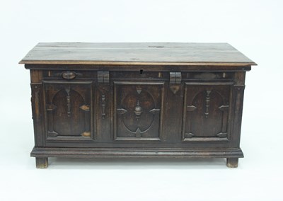 Lot 954 - A late 17th Century oak coffer, the planked...