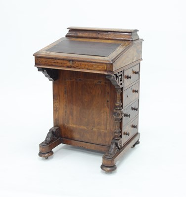 Lot 956 - A Victorian walnut Davenport desk, the top...