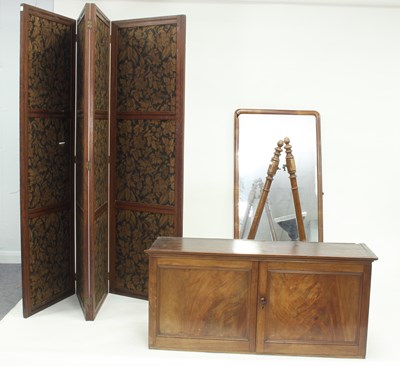 Lot 957 - A mahogany cupboard enclosed by panel doors,...