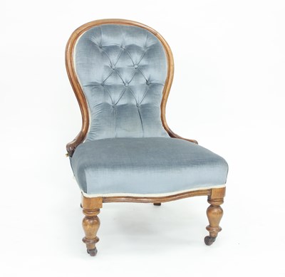 Lot 980 - A Victorian nursing chair with blue velvet...