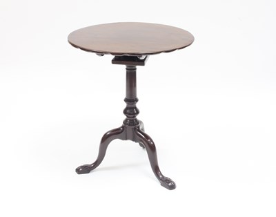 Lot 983 - A George III mahogany tripod table on bird...