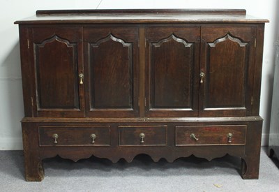 Lot 986 - An 18th Century oak mule chest, the now fixed...