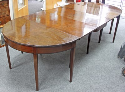 Lot 991 - A George III mahogany D-end dining table with...