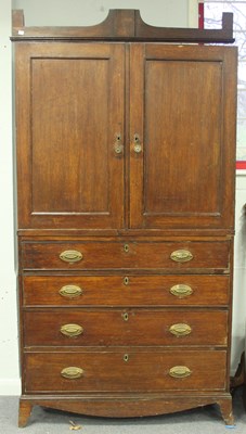 Lot 993 - A 19th Century oak linen press, the upper...