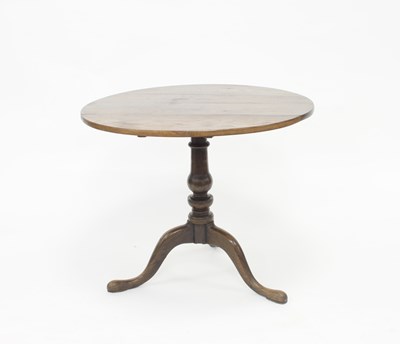 Lot 994 - A George III oak supper table, the circular...