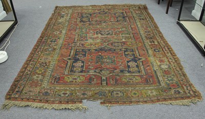 Lot 1 - An Oriental runner, twelve medallions on an...