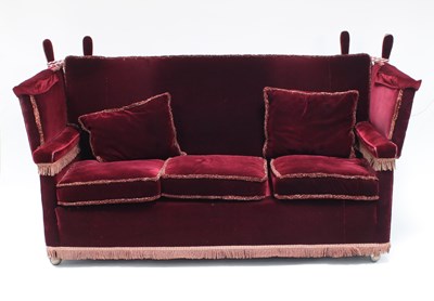 Lot 29 - A Knole settee and two armchairs in red velvet,...