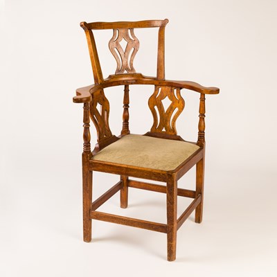 Lot 32 - A George II elm and ash corner chair with...