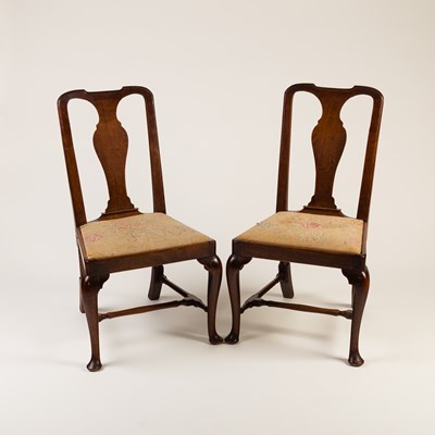 Lot 42 - A pair of George I walnut side chairs, with...