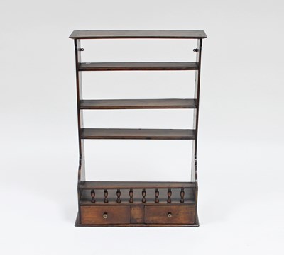 Lot 45 - A 19th Century walnut rack of shelves with...