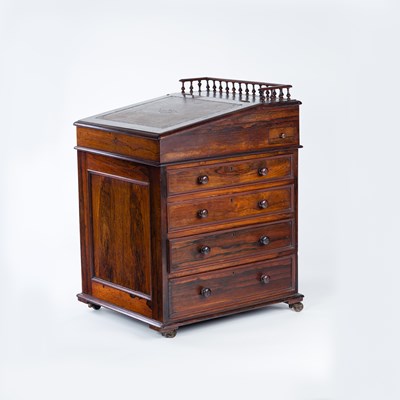 Lot 49 - A 19th Century rosewood Davenport writing desk,...