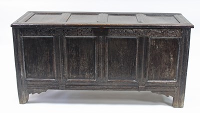 Lot 55 - An 18th Century oak chest with four panels to...