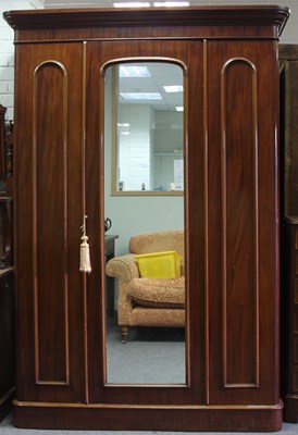 Lot 56 - A Victorian mahogany wardrobe, the moulded...