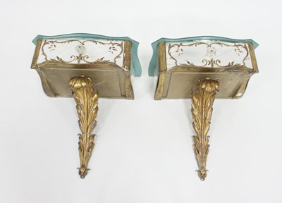 Lot 64 - A pair of 20th Century mirrored console tables...