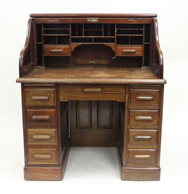 Lot 65 - An Edwardian mahogany estate desk by Simpole's...