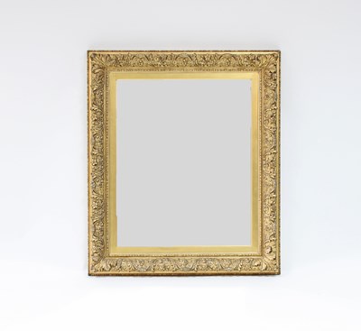 Lot 75 - A carved giltwood wall mirror, of rectangular...