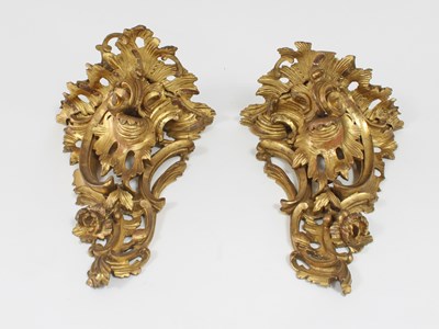 Lot 76 - A pair of late 18th/early 19th Century carved...