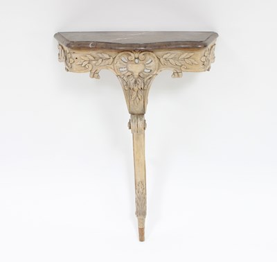 Lot 86 - A small marble top table with serpentine front,...