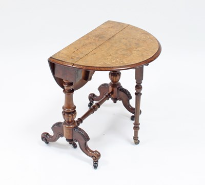 Lot 94 - A Victorian burr walnut Sutherland table, the...